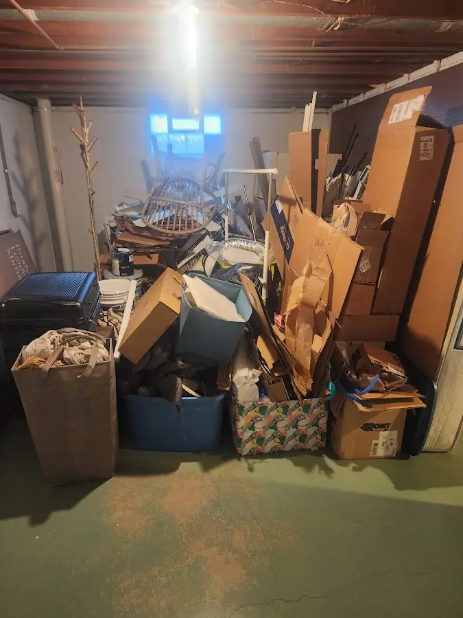 Roll-off dumpster container at job site for Concrete Dumpster Rental in Tolland